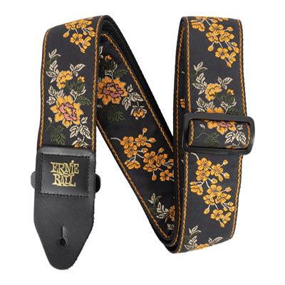 Floral-patterned guitar strap with Ernie Ball logo on a white background